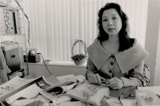 Designer copies: Right, Pearl Chan, in the showroom of her business Chansfield Clothing, wears a Byblos-inspired, portrait-collar jacket