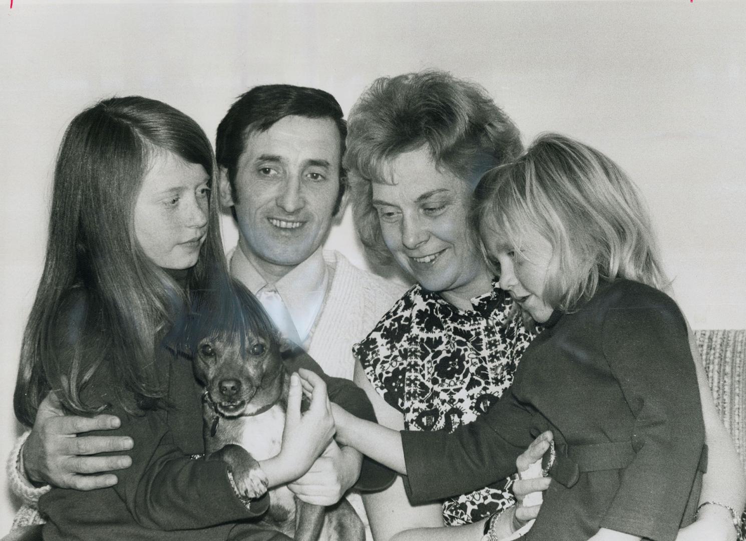 The hall family from Belfast: Janice, 10, Cecil, Ann and Fiona, 4, Their neighbors, Catholic and Protestant alike, gave them farewell presents and wished them luck