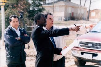 Judge Hugh Fraser at shooting site Ipperwash (black, in suit)