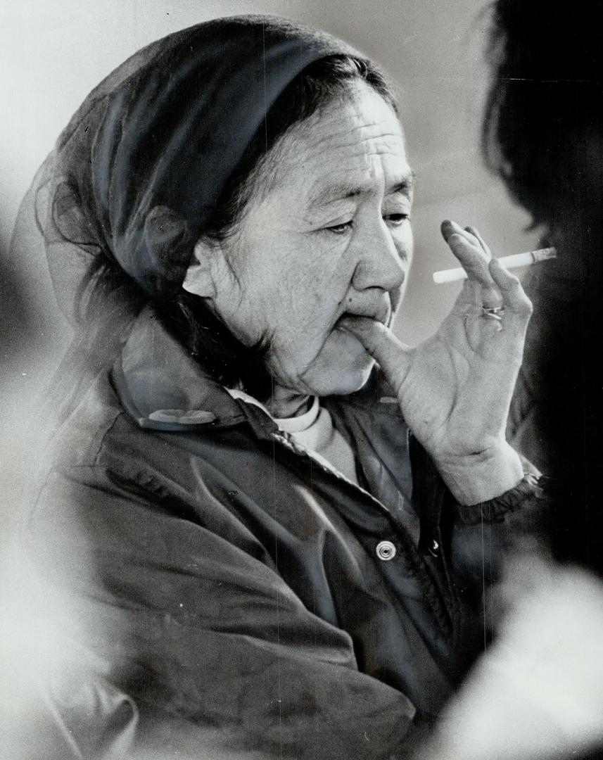 A Woman of the Bonaparte band listens at a meeting with Indian Affairs Minister Judd Buchanan