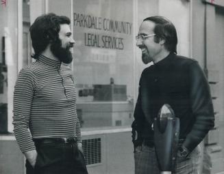 Law Professor Fred Zemans (right) talks with lawyer Dick Gathercole on Queen St