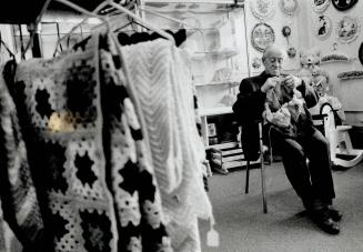 Knitting away: Clarence Brooks, 86, started knitting after he retired and has made many items for perpetual Bazaar, a Brampton store run by seniors