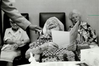 It's grand to be over 100, Annie Strudwick, right, obviously gets a kick out of turning 104 as she celebrates at Heritage Nursing Home, and the same f(...)