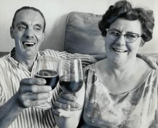 Mr. and Mrs. William G. Carter sip their first-ever glasses of champagne today after learning of their $25,000 win in the Irish Sweepstakes. For milkm(...)