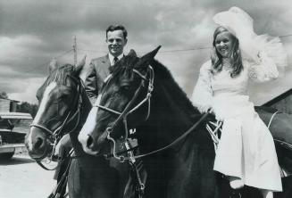 They're horseback honeymooners, Dan Irwin 21