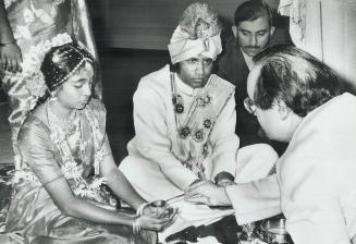 Near wedding tragedy, During a traditional Hindu wedding ceremony last night in Rexdale, the hair of candle bearer Shyamala Lawrence (left), 12, caugh(...)