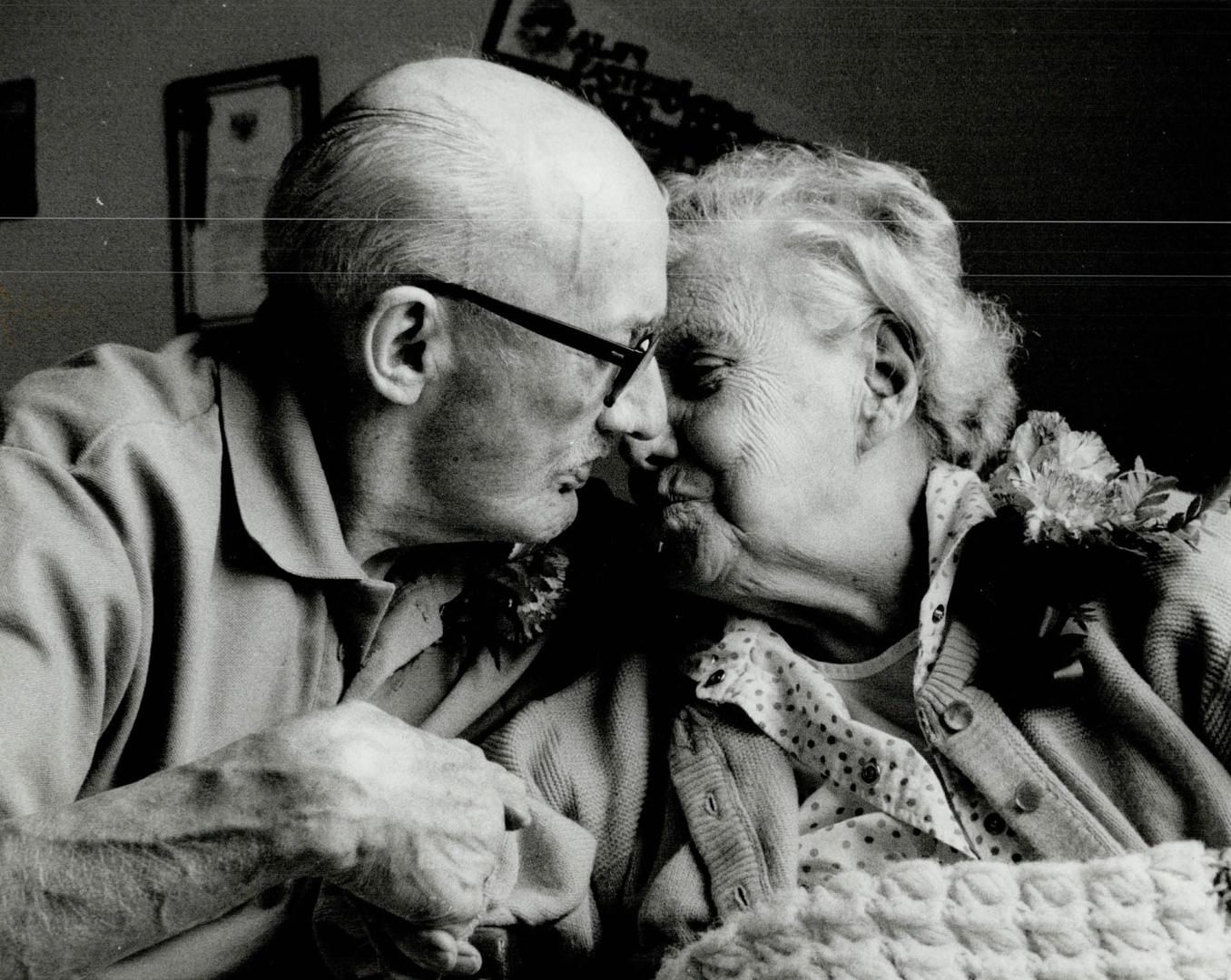 Sharing a lifetime of love and laughter, Sydney and Margaret Clay, both 91 years of age and from Scarborough, share a tender moment at their retiremen(...)