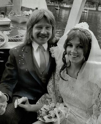 They tied the knot nautically, Mr. and Mrs. John Ellis are pictured aboard a boat which took them to their wedding reception yesterday after their mar(...)