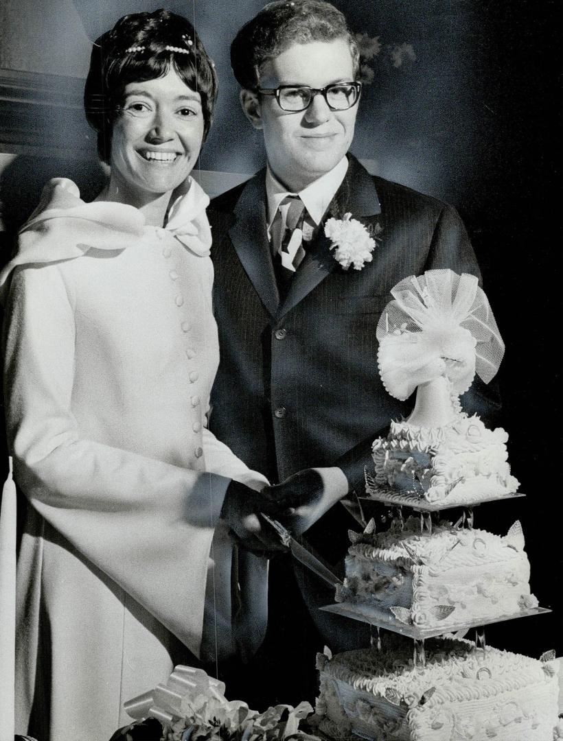 Mr. and Mrs. Anthony Peter Michener are seen after wedding Saturday at little Trinity Anglican Church. Groom is Governor-General Roland Michener's nephew