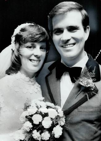 Lynn Thomas of London, Ont., and Reginald Renouf of Caesarea, near Oshawa, smile after their wedding Saturday in Clarkson. The reception was at the Ci(...)