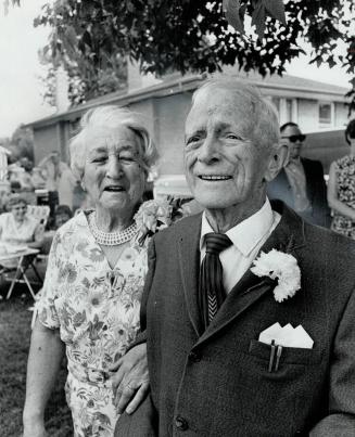 Mr. And Mrs. Charles Henry Lee pose on their lawn, The couple celebrated their wedding anniversary surrounded by relatives