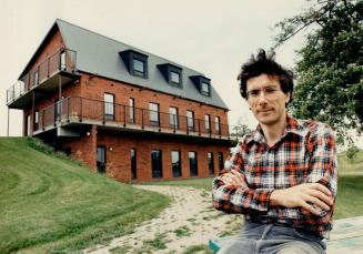 No pollutants: Engineer Bruce Small works out of a pollutant-free home he built because he is allergic to tobacco smoke and the kinds of chemicals commonly used in office carpeting and wallpaper