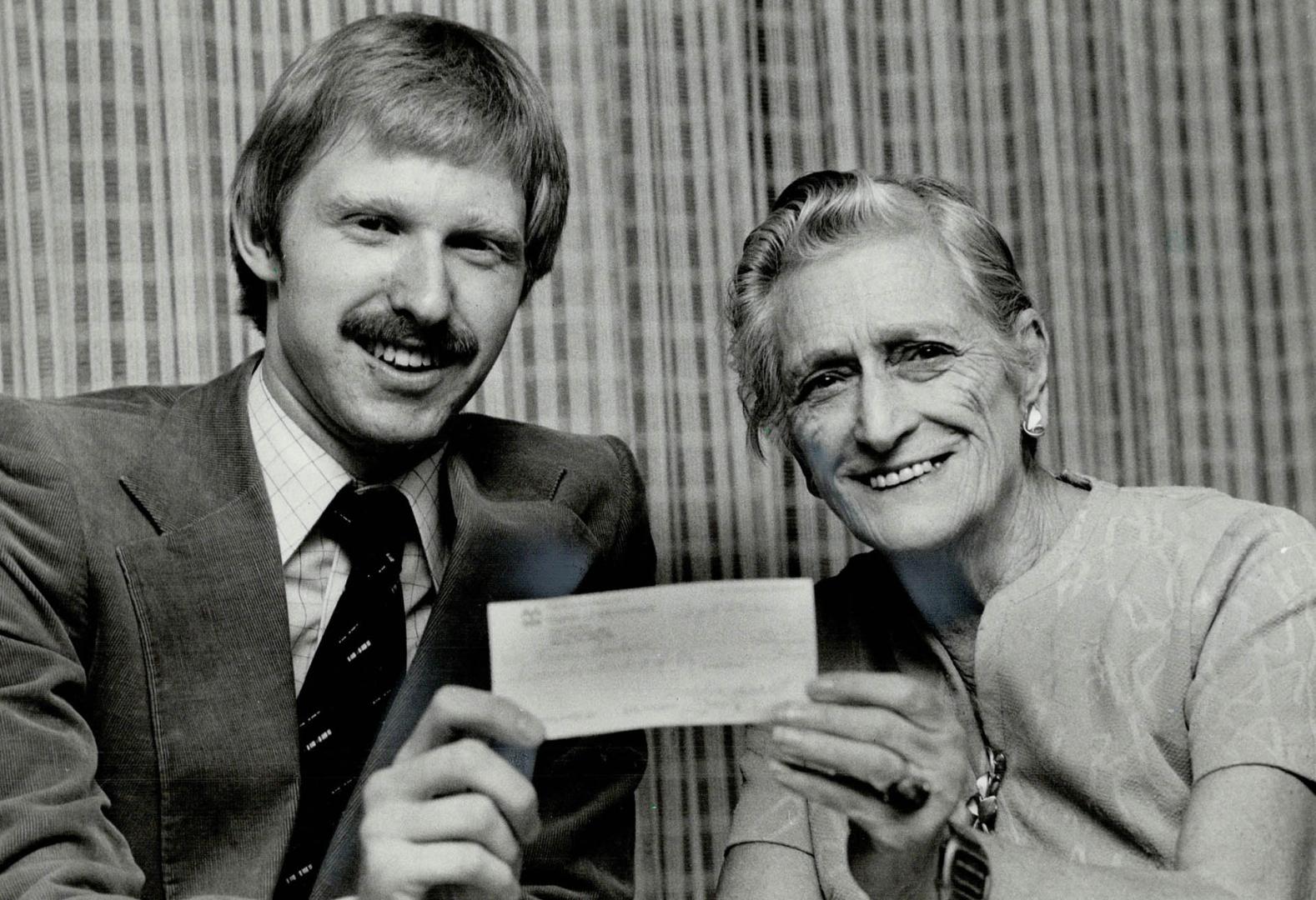 Heartwarming: Cancer amputee Kevin Snider, 22, was presented with a $750 cheque by Ivy Dawson,77, of Spencer House for senior citizens, to go toward buying an artificial leg