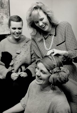 New style: Nurse Leslee Thompson, middle, and Mary Kay executive Sharon Colbourn help cancer patient Gayle Maclean fashionably disguise her hair