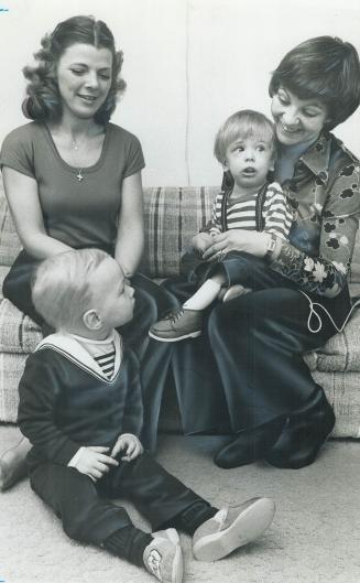 You'd really like to do it all for him but that way he'll never try anything, says Pat Campbell, right, holding Matthew who has cerebral palsy, with Helle cooper and her son Ryan