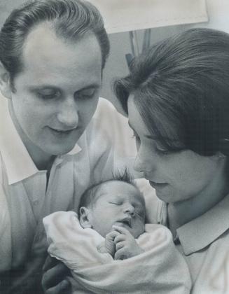 Two-Week-Old Kevin Laffan, Jr., With Parents Kevin, Sr., and Shirley, We Just Can't Believe He Came Through It so Well, Says 18-year-old Mother