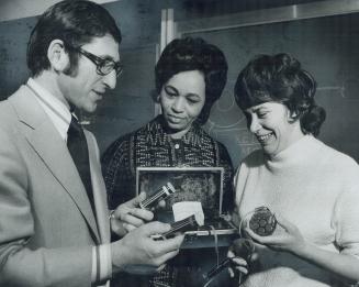 Without skipping a beat Lorraine Boyko (right) can telephone Toronto General Hospital's Pacemaker Clinic for a pulse rate. Dr. Bernard Goldman (left) (...)