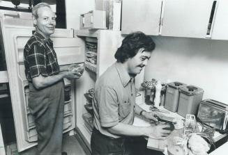 By themselves in a Toronto apartment is a new way of life for Monte Lund, left, and David Kim two are mentally retarded men who can't read or write an(...)