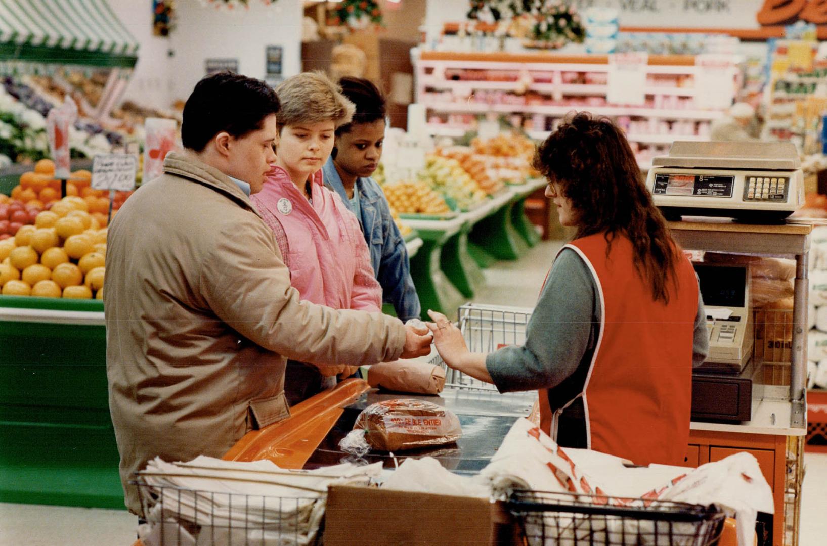 The Association for Community Living's Mia McGowan goes on a shopping training run with client Kevin Kelly