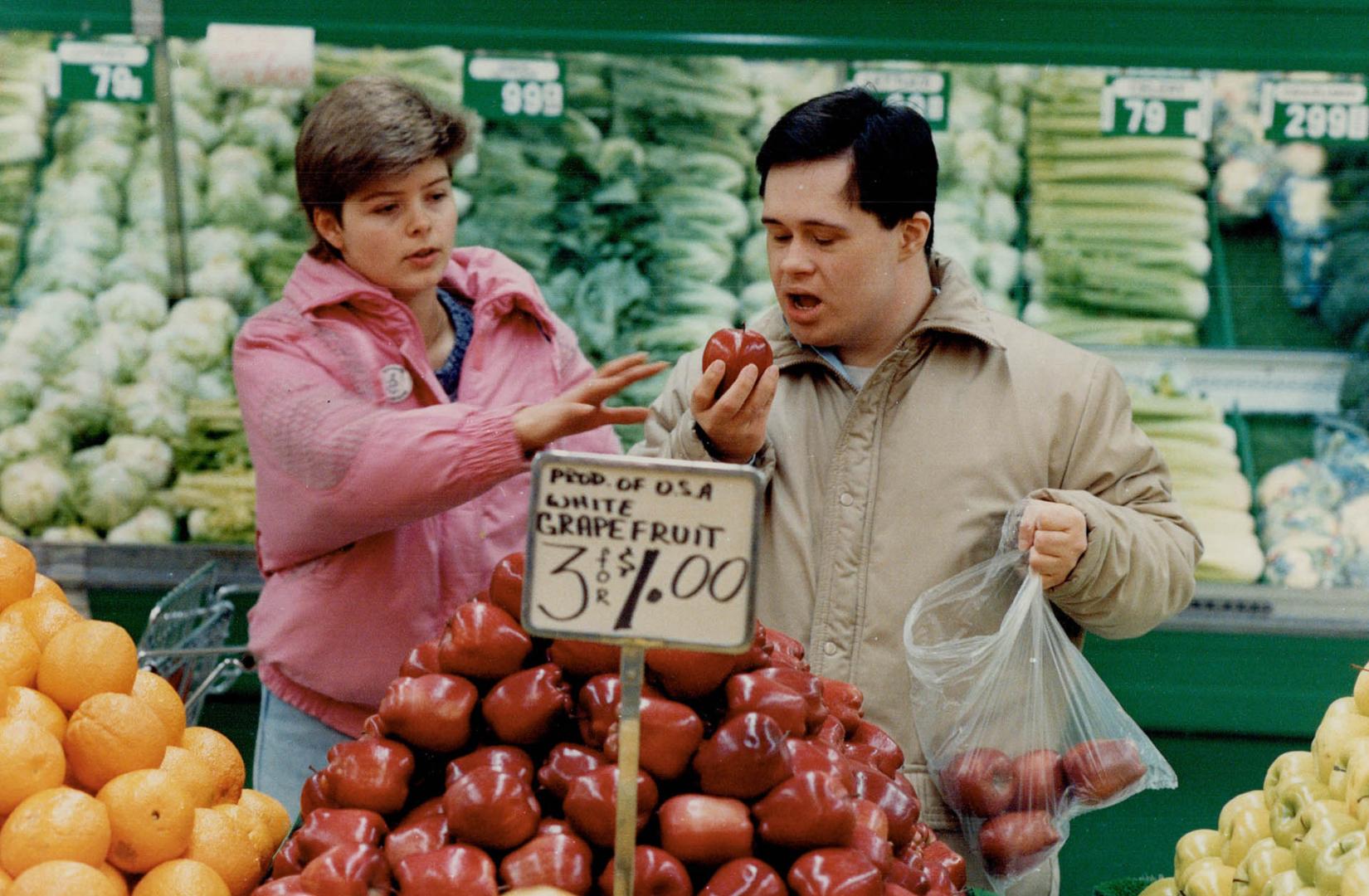 The Association for Community Living's Mia McGowan goes on a shopping training run with client Kevin Kelly