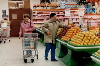 The Association for Community Living's Mia McGowan goes on a shopping training run with client Kevin Kelly