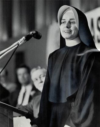 Battery of Microphones, rapt audience or Canadian advertising men and women faced Sister Jacqueline at Royal York luncheon yesterday