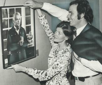 Photographer Tony Hauser and wife Leah, who is a model, His picture of conductor Victor Feldbrill is in exhibit at O'Keege Centre