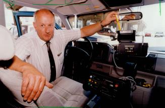 Constable Noel Readman with new pholo radar machinery