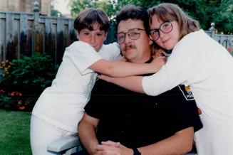 York Region Constable Barry Smith with daughters Kaelyn and Krysten