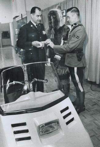 Royal Canadian Mounted Police northern service, Commissioner Ed. R. Lysyk (left) and Sgt. Paul Robin