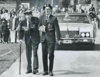 Charles J. Leonard, 99, who joined the North West Mounted Police in Queen Victoria's day, celebrates Victoria Day by visiting the RCMP centennial disp(...)