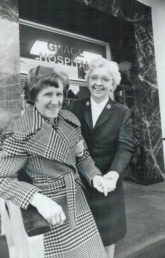 Maj. Eleanor Johnson says goodby to patient Betty McBride