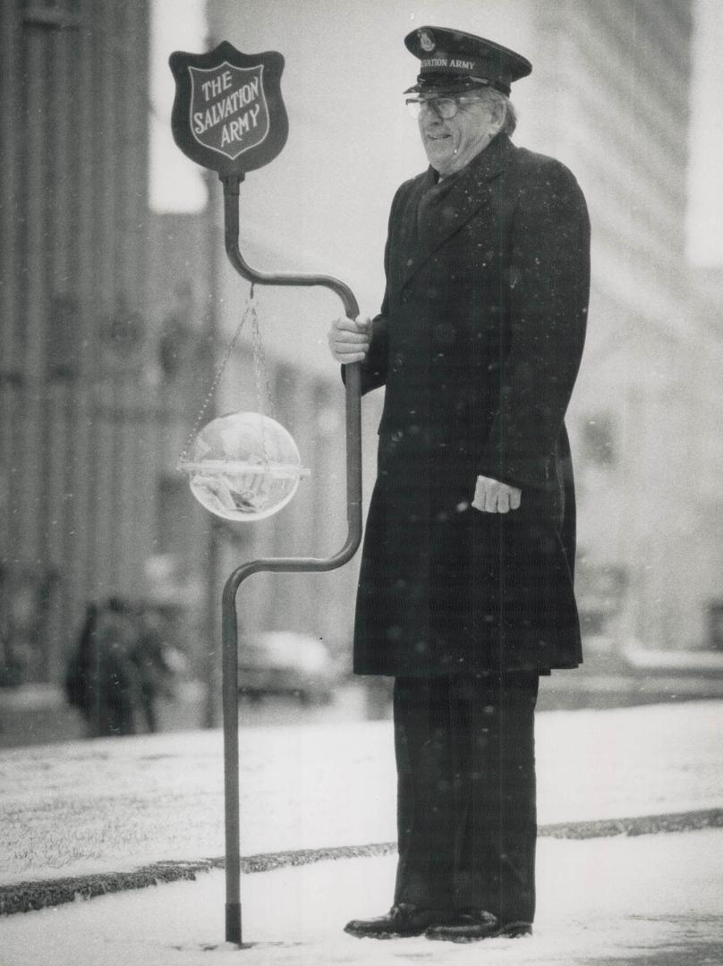 A time to give, Major Hugh Tilley does his Christmas duty at Queen and Bay Sts