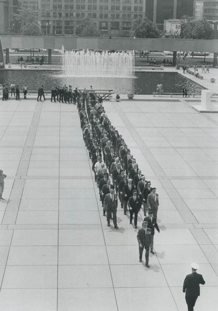 Proudly marching across the square at City Hall today after laying a wreath at the Cenotaph in honor of their fallen comrades are Dieppe prisoners of (...)