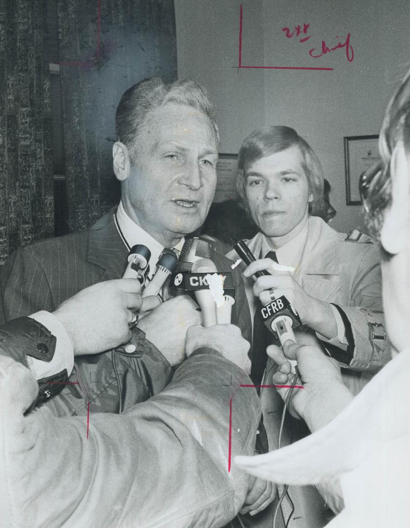 Police Chief Harold Adamson talks with newsmen before kidnappers freed Marilyn Lastman