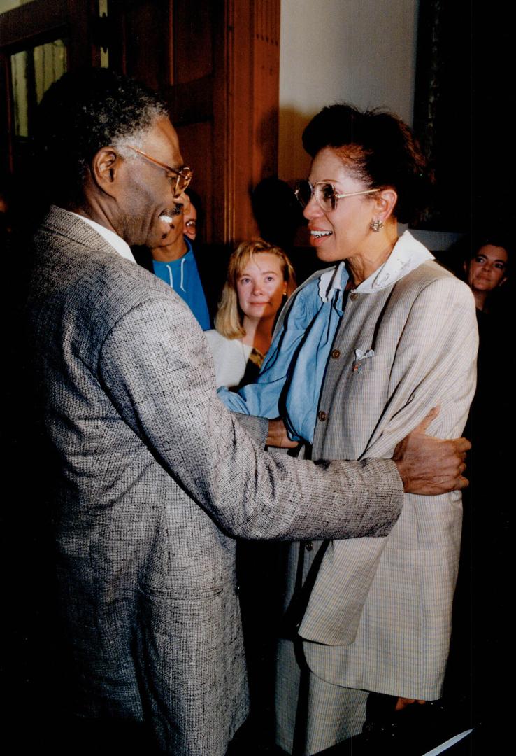 Supportive spouse: Zanana Akande is greeted by husband Isaac outside the Legislature after resigning from cabinet