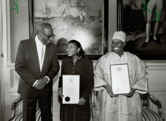 Fighting Racism, Former lieutenant-governor Lincoln Alexander, left, presents the Lincoln M