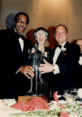 Award winners: Lieutenant-Governor Lincoln Alexander, Mary Jackman and Steve Stavro display the Canadian Award given to outstanding citizens in memory of John Diefenbaker