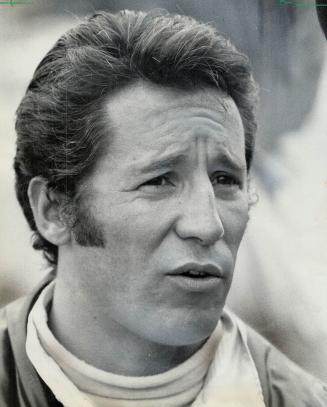 Mario Andretti. Bids with a Ferrari