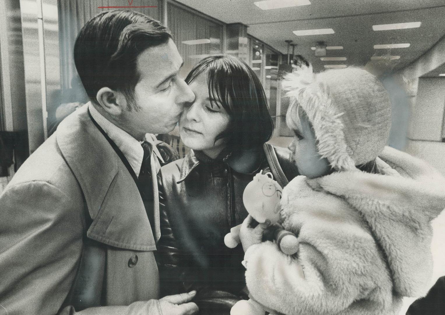 A tearful farewell at Toronto International Airport yesterday, as Susan Andrews, 23, with her daughter, Tracey, say goodby to Susan's dad, Walter Slat(...)