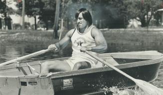 Argo rows his own boat. Argo place-kicker Zenon Andrusyshyn displays power during rowing event at yesterday's Superstar competition at Etobicoke Cente(...)