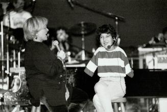 Sounding the right note. Maureen Arthur, left, performs a duet with young Ali Menke yesterday during a rehearsal for this weekend's Variety Telethon a(...)