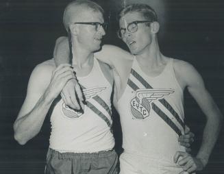 Exhausted. But it was worth it. Dave Bailey (right) literally is carried by Bill Crothers after Bailey ran mile in 3 minutes, 57.7 seconds at Police G(...)