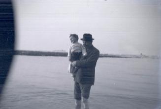 Arthur Conan Doyle at the seaside with his son Denis [E]