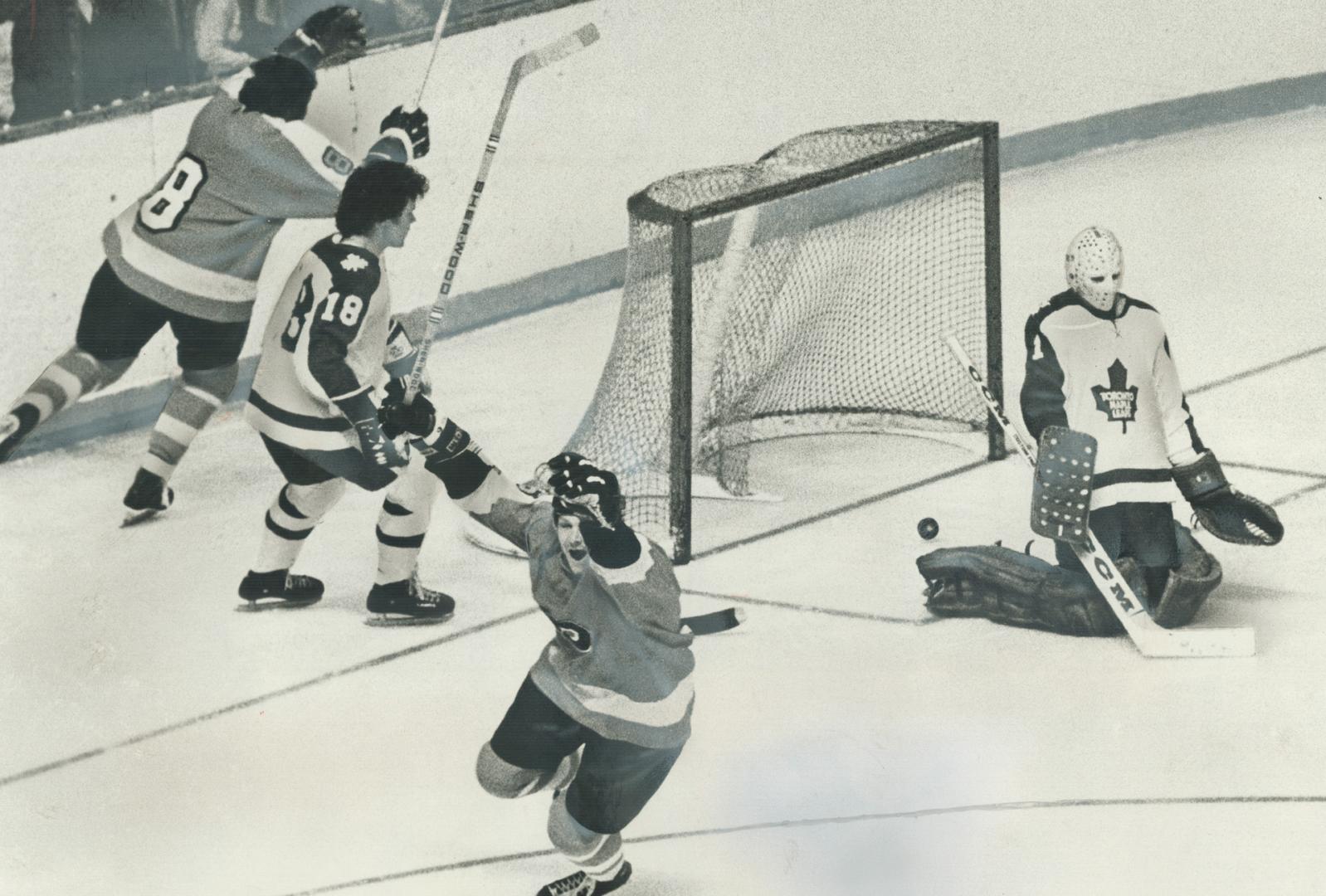 Whooping with joy, Philadelphia Flyers' Andre Dupont raises stick and goes into dance after scoring overtime goal that gave his team 4-3 win Saturday (...)