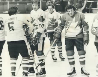 Phil Esposito (right) is growling even at first workout of team canada