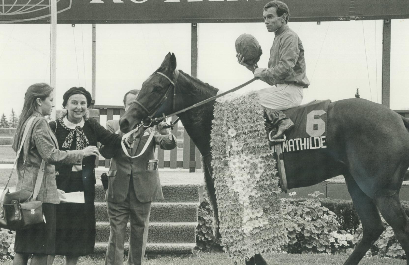 And the winner is . . . Reine Mathilde, a 3-year-old filly ridden by Australian Gary Moore, overpowered 10 opponents to win the E.P. Taylor Stakes at (...)