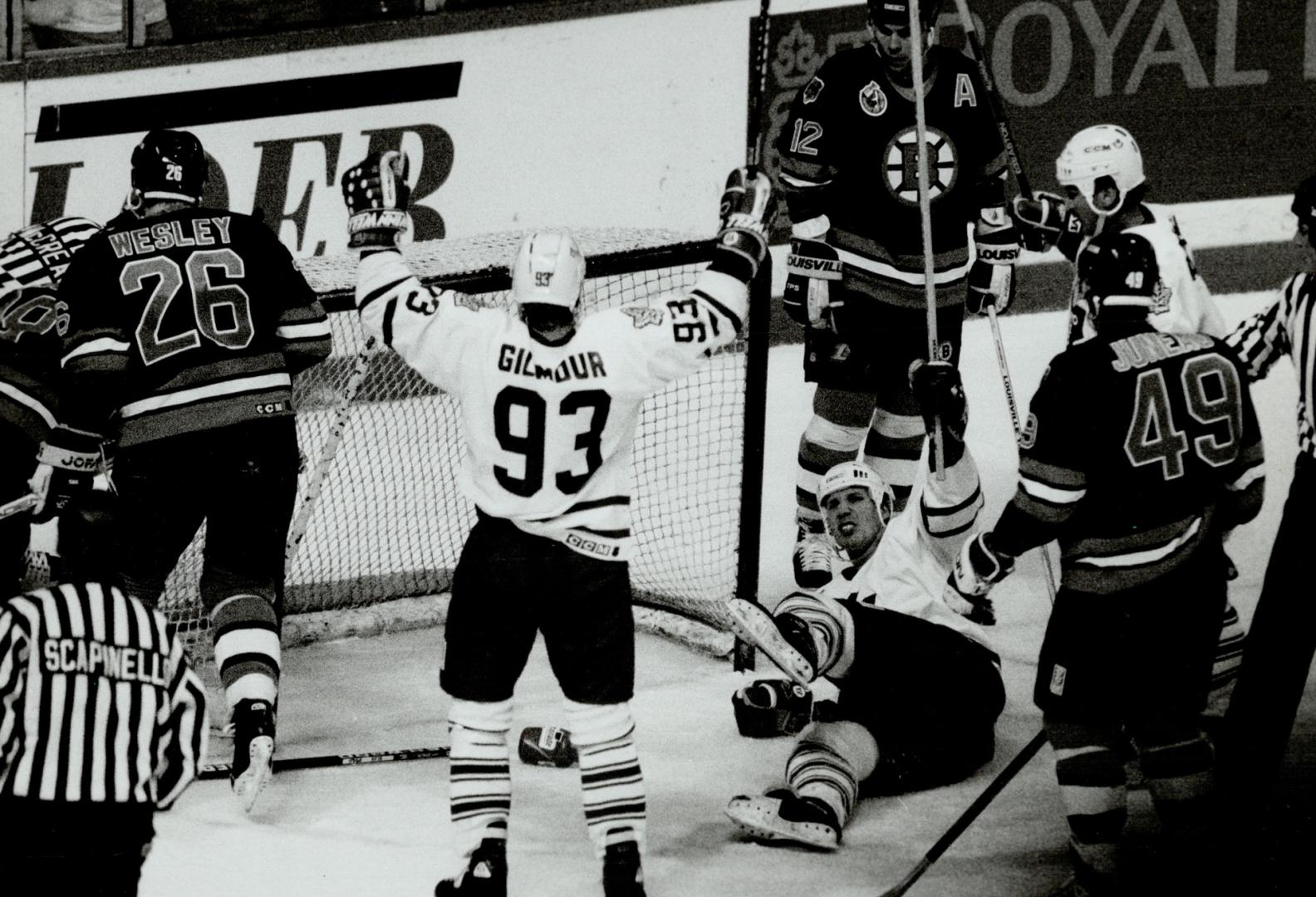 Great tandem: Dave Andreychuk, on his backside, has best seat in house to see his tying goal Saturday against the Bruins, on an assist from Doug Gilmour