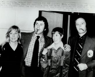 (L to R) Candy and Mike, Mr. and Mrs. Walton, Mrs. Jim Harrison, Liz, and Gerry Cheevers, all gussied up leave the Mesperia Hotel for the reception at the Canadian Embassy in Helsinki