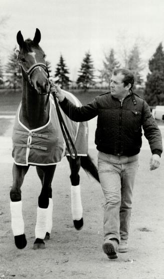 Queen's plate winner Bompago with John Carrella